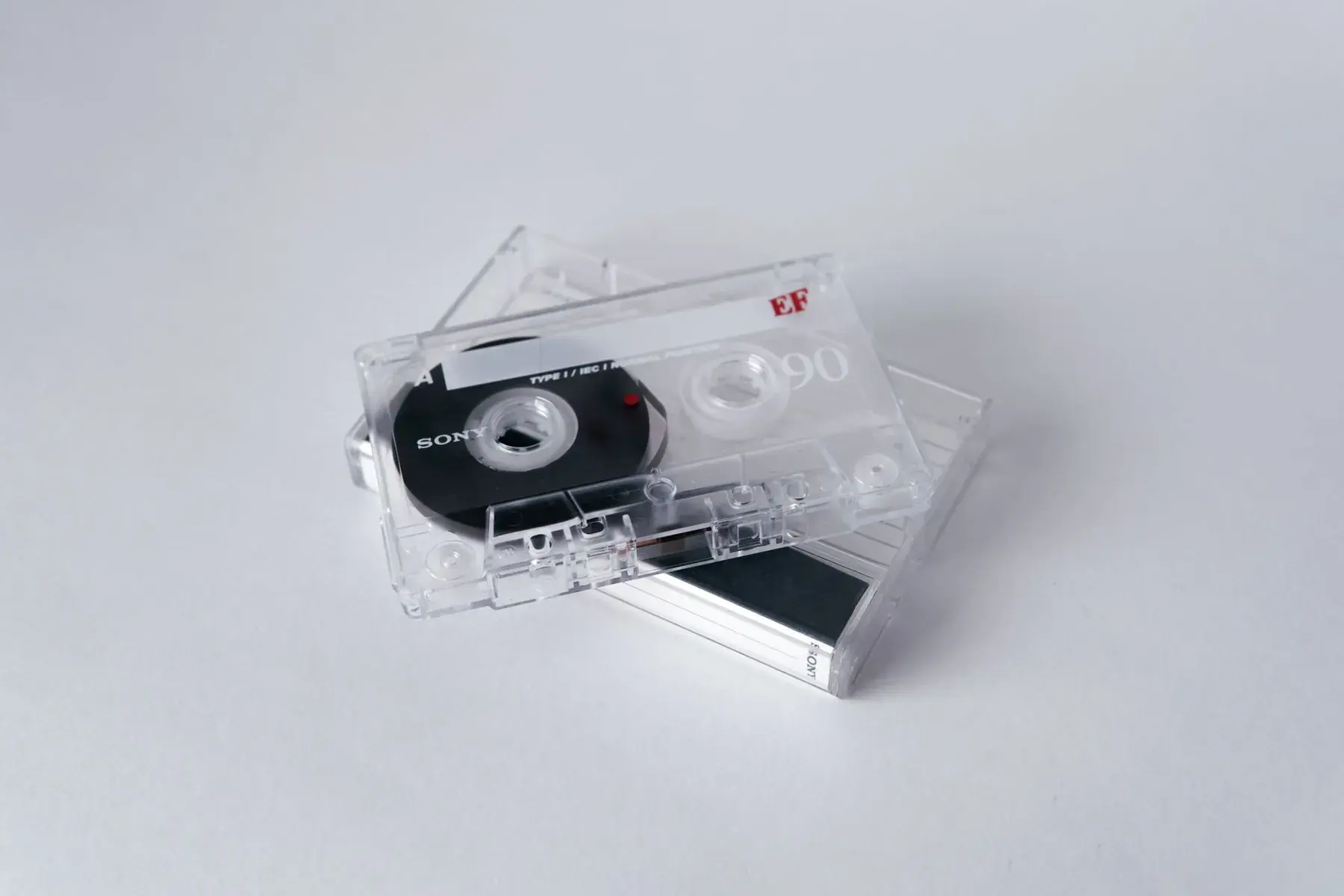 Audio cassettes on a white background.